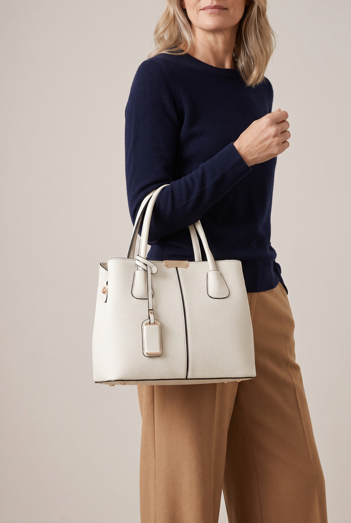 Elnora top-handle tote in white - carried on the arm