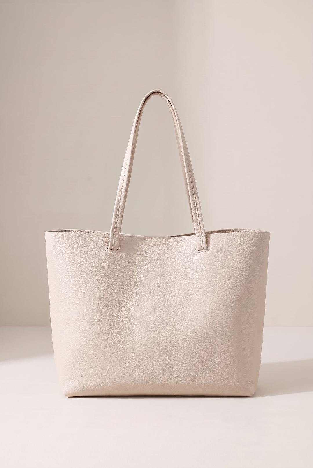 Reyna minimalist tote in beige - front view