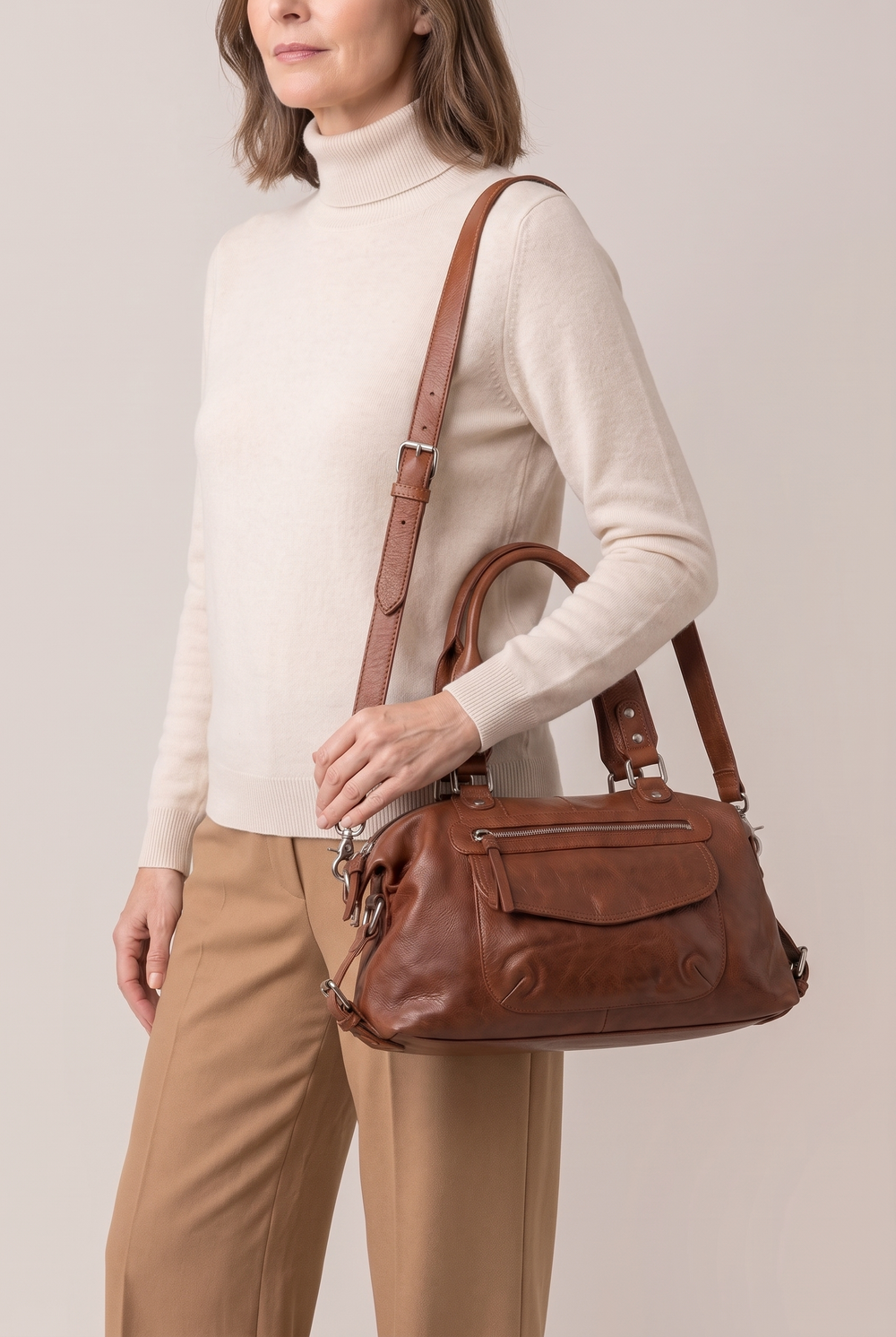 Elsie soft faux leather shoulder bag in brown - worn on the shoulder