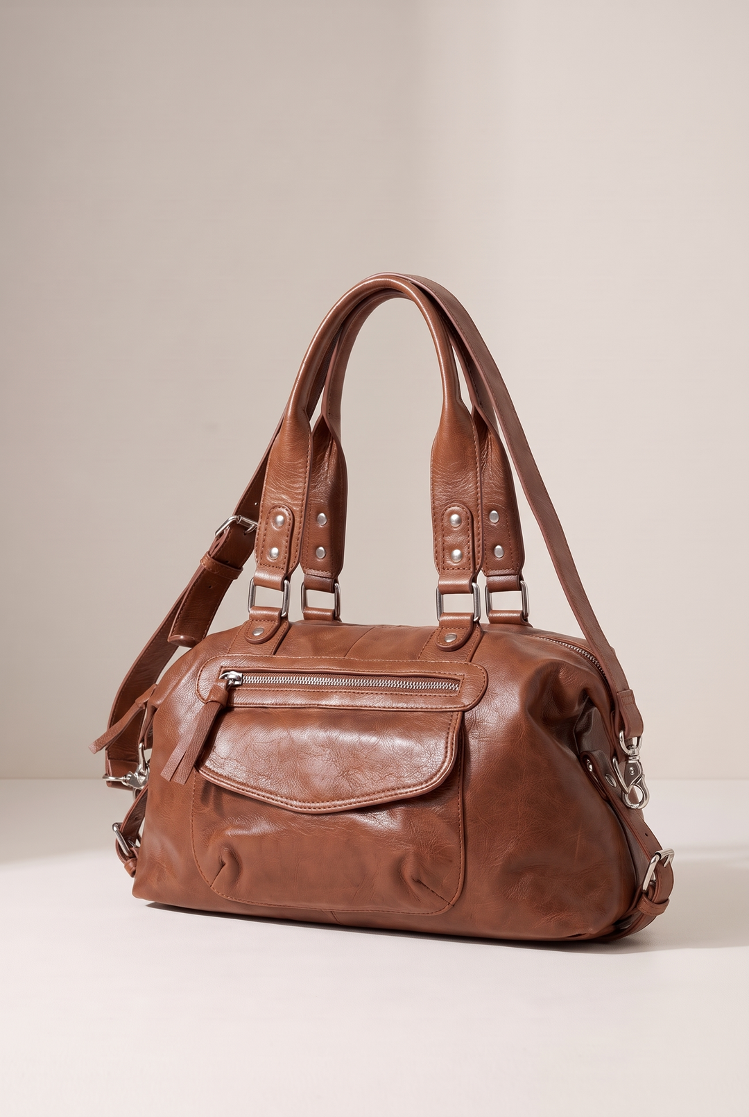 Elsie soft faux leather shoulder bag in brown - angle view